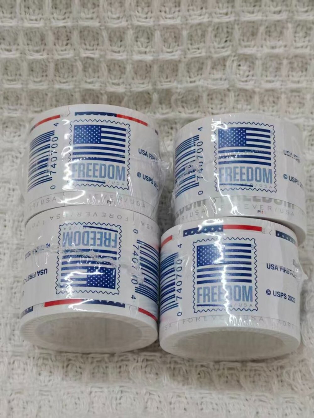 5 rolls of USPS stamps, 500 brand new stamps in total